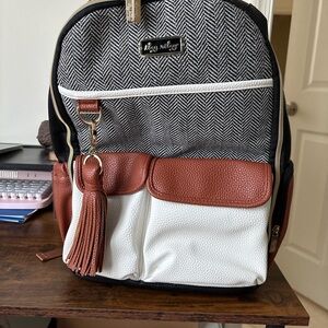 Itzy Ritzy Black and Brown Backpack with Leather Accents